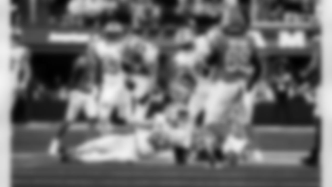 Detroit Lions edge rusher Aidan Hutchinson (97) and Detroit Lions linebacker Alex Anzalone (34) sack Los Angeles Rams quarterback Matthew Stafford (9) during an NFL football game against the Los Angeles Rams on Sunday, Dec. 14, 2025 in Inglewood, Calif. (Jeff Nguyen/Detroit Lions via AP)