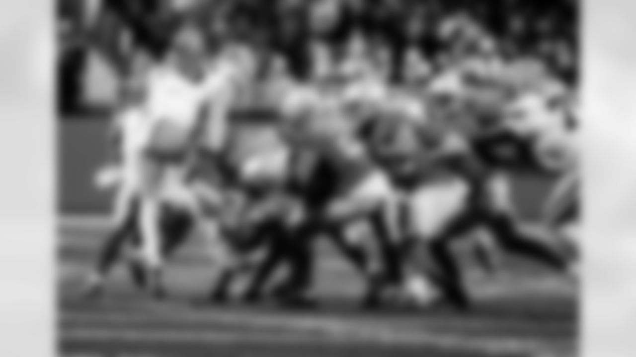 Detroit Lions linebacker Alex Anzalone (34), Detroit Lions cornerback Amik Robertson (21), and Detroit Lions defensive back Brian Branch (32) during an NFL football game against the Green Bay Packers on Thursday, Nov. 27, 2025 in Detroit. (Jeff Nguyen/Detroit Lions via AP)