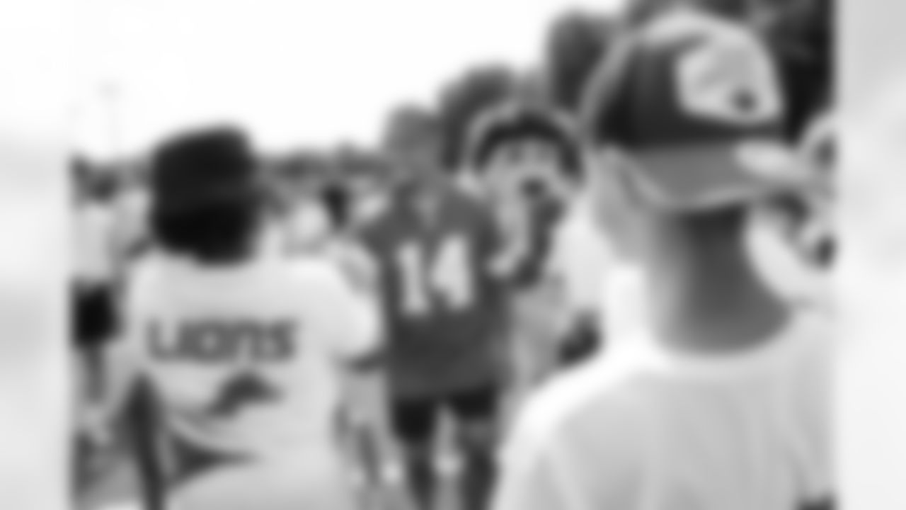 Detroit Lions wide receiver Amon-Ra St. Brown (14) and Detroit Lions German mascot Leo at a youth football camp on June 22, 2025 in Cologne, Germany. (Stuart Zaas/Detroit Lions)