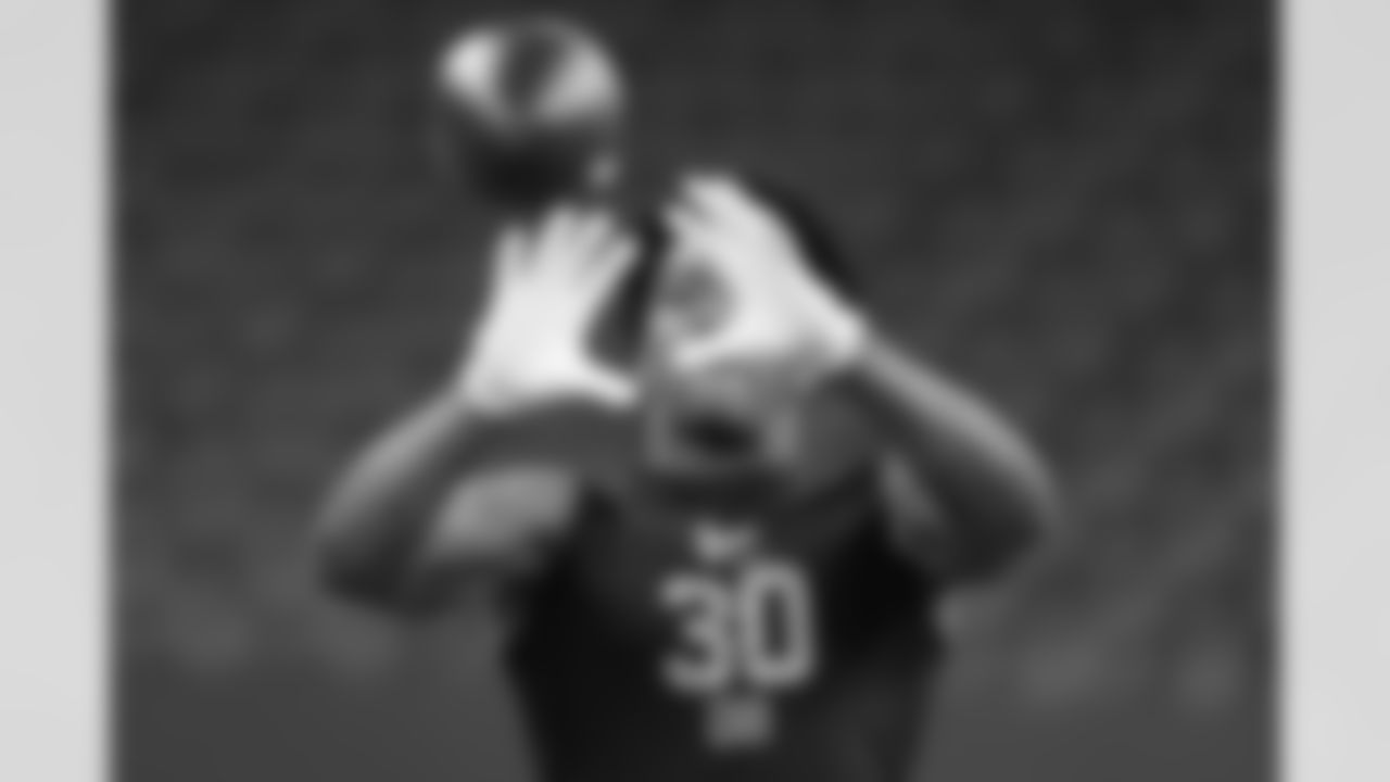 Toledo defensive back Avery Smith (30) runs a drill at the NFL football scouting combine in Indianapolis, Friday, Feb. 27, 2026. (AP Photo/Michael Conroy)