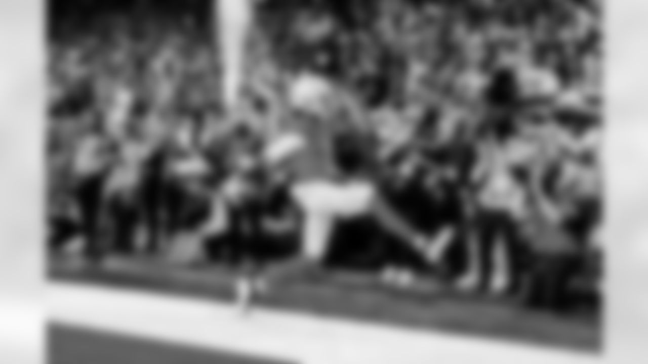 Detroit Lions wide receiver Jameson Williams (1) scores a touchdown during an NFL football game against the Green Bay Packers on Thursday, Nov. 27, 2025 in Detroit. (Jeff Nguyen/Detroit Lions via AP)