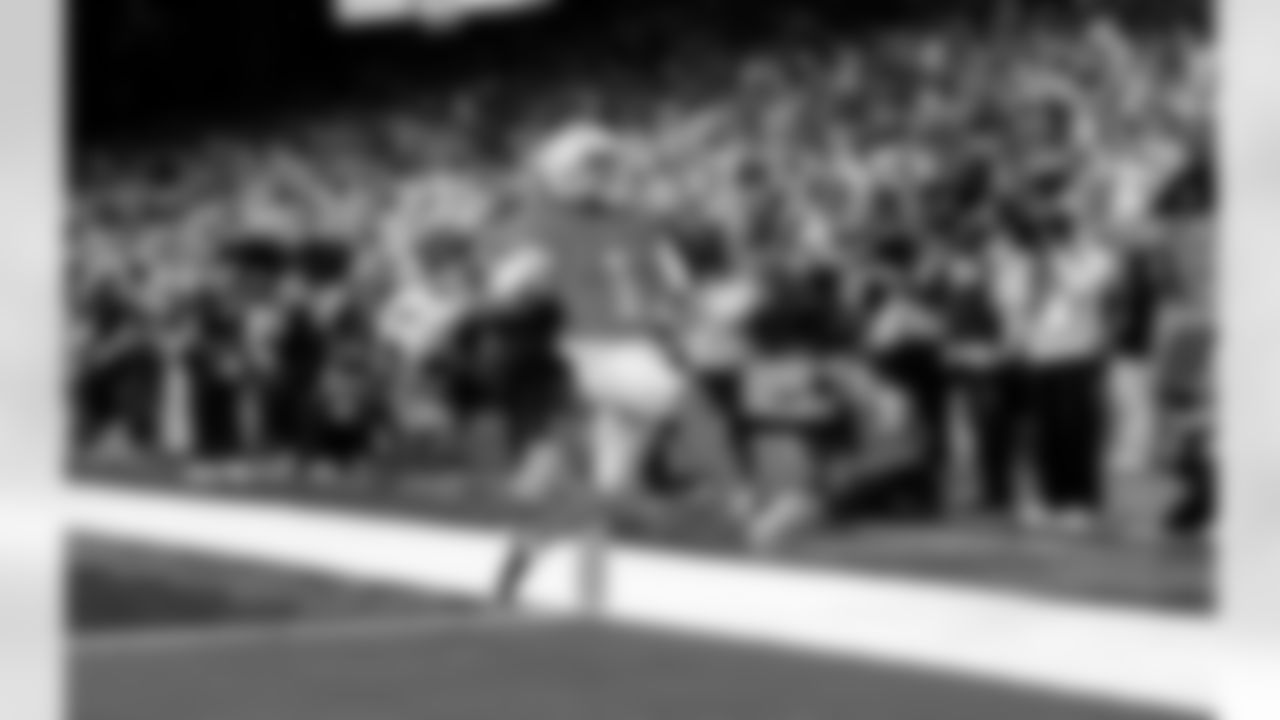 Detroit Lions wide receiver Jameson Williams (1) scores a touchdown during an NFL football game against the Green Bay Packers on Thursday, Nov. 27, 2025 in Detroit. (Jeff Nguyen/Detroit Lions via AP)