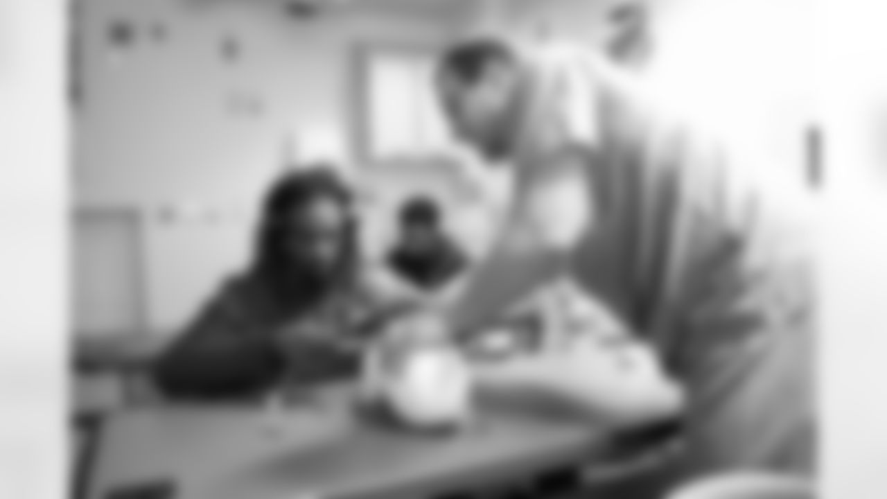 A student participating in an exercise with a HFH employee during a Detroit Lions Academy health and wellness field trip at the Henry Ford Health campus on Feb. 27, 2026 in Detroit. (Izzy Rincon/Detroit Lions)