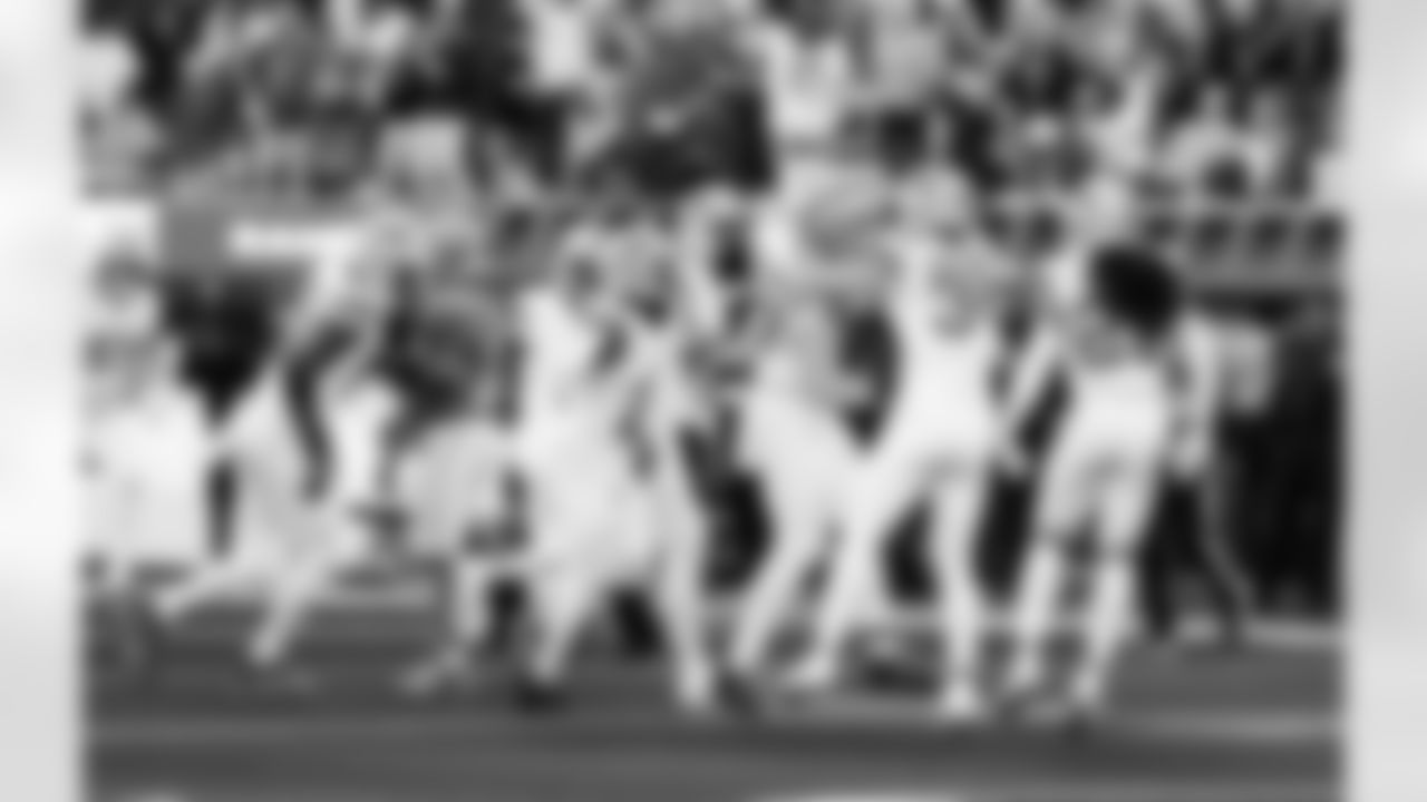 Detroit Lions edge rusher Al-Quadin Muhammad (96), Detroit Lions cornerback Amik Robertson (21), Detroit Lions edge rusher Aidan Hutchinson (97), and Detroit Lions linebacker Alex Anzalone (34) celebrate after a touchdown during an NFL football game against the Los Angeles Rams on Sunday, Dec. 14, 2025 in Inglewood, Calif. (Jeff Nguyen/Detroit Lions via AP)