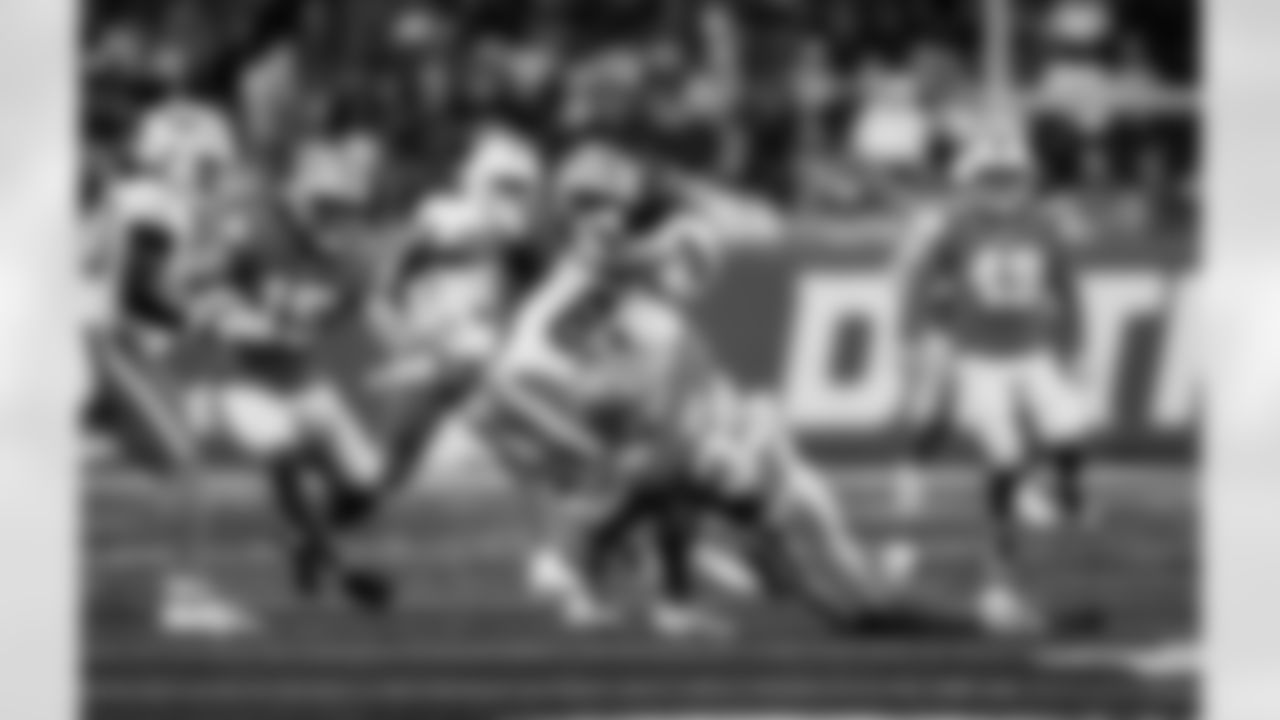 Detroit Lions running back Sione Vaki (33) forces a fumble during an NFL football game against the Miami Dolphins, Saturday, August 16 in Detroit. (Jeff Nguyen/Detroit Lions via AP)