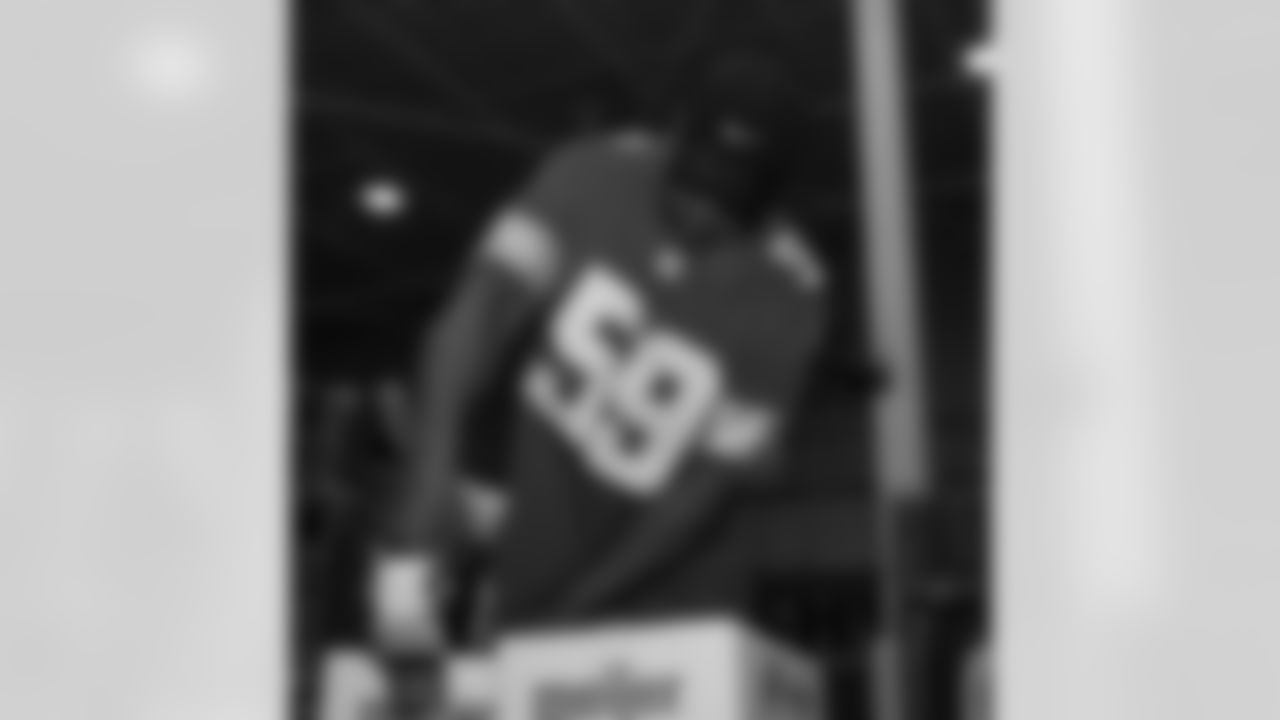 Lions Legend Jimmy Williams (59) taping boxes during a Thanksgiving meal packing event at Gleaners Community Food Bank on Oct. 14, 2025 in Taylor, Mich. (Izzy Rincon/Detroit Lions)