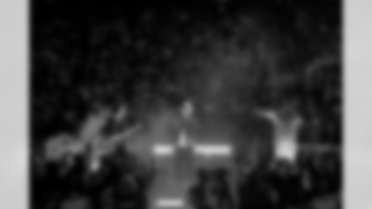 Jack White and Eminem perform during the Thanksgiving Halftime Show powered by Verizon during an NFL football game against the Green Bay Packers on Thursday, Nov. 27, 2025 in Detroit. (Jeff Nguyen/Detroit Lions via AP)