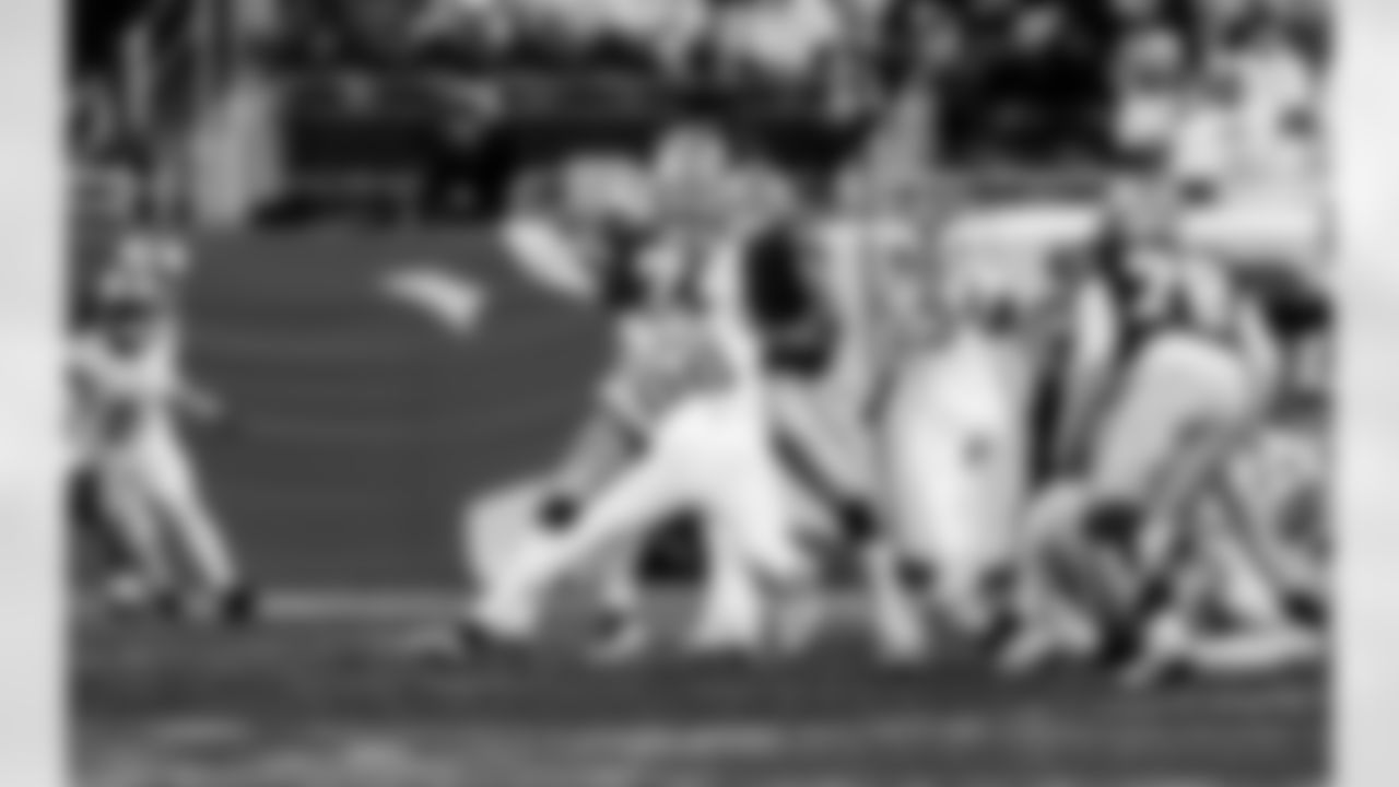 Detroit Lions edge rusher Al-Quadin Muhammad (96) sacks Dallas Cowboys quarterback Dak Prescott (4) during an NFL football game against the Dallas Cowboys on Thursday, Dec. 4, 2025 in Detroit. (Jeff Nguyen/Detroit Lions via AP)