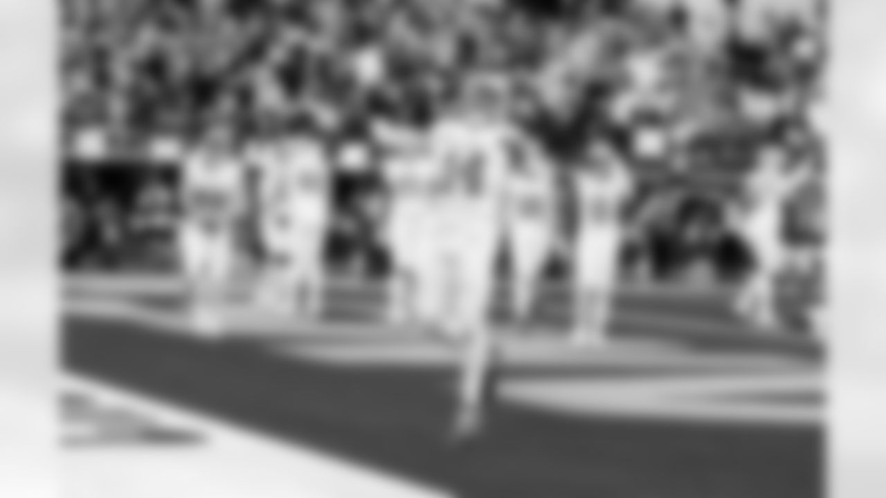 Detroit Lions wide receiver Amon-Ra St. Brown (14) celebrates after a touchdown during an NFL football game against the Los Angeles Rams on Sunday, Dec. 14, 2025 in Inglewood, Calif. (Jeff Nguyen/Detroit Lions via AP)