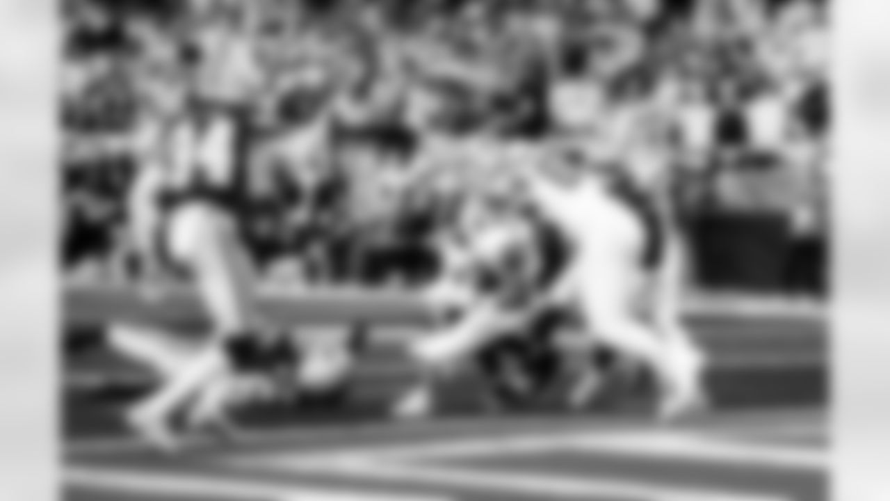 Detroit Lions running back Jahmyr Gibbs (0) scores a touchdown during an NFL football game against the Dallas Cowboys on Thursday, Dec. 4, 2025 in Detroit. (Jeff Nguyen/Detroit Lions via AP)