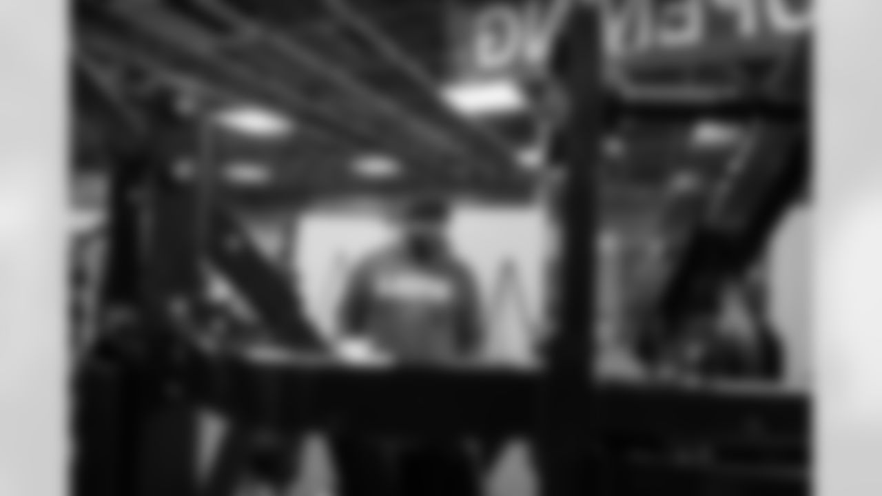 Lions Legend Alex Lewis (59) works with students during a Health and Wellness room reveal during a Count Day activation event at Detroit Lions Academy on Feb. 11, 2026 in Detroit. (Carl Jones II/Detroit Lions)