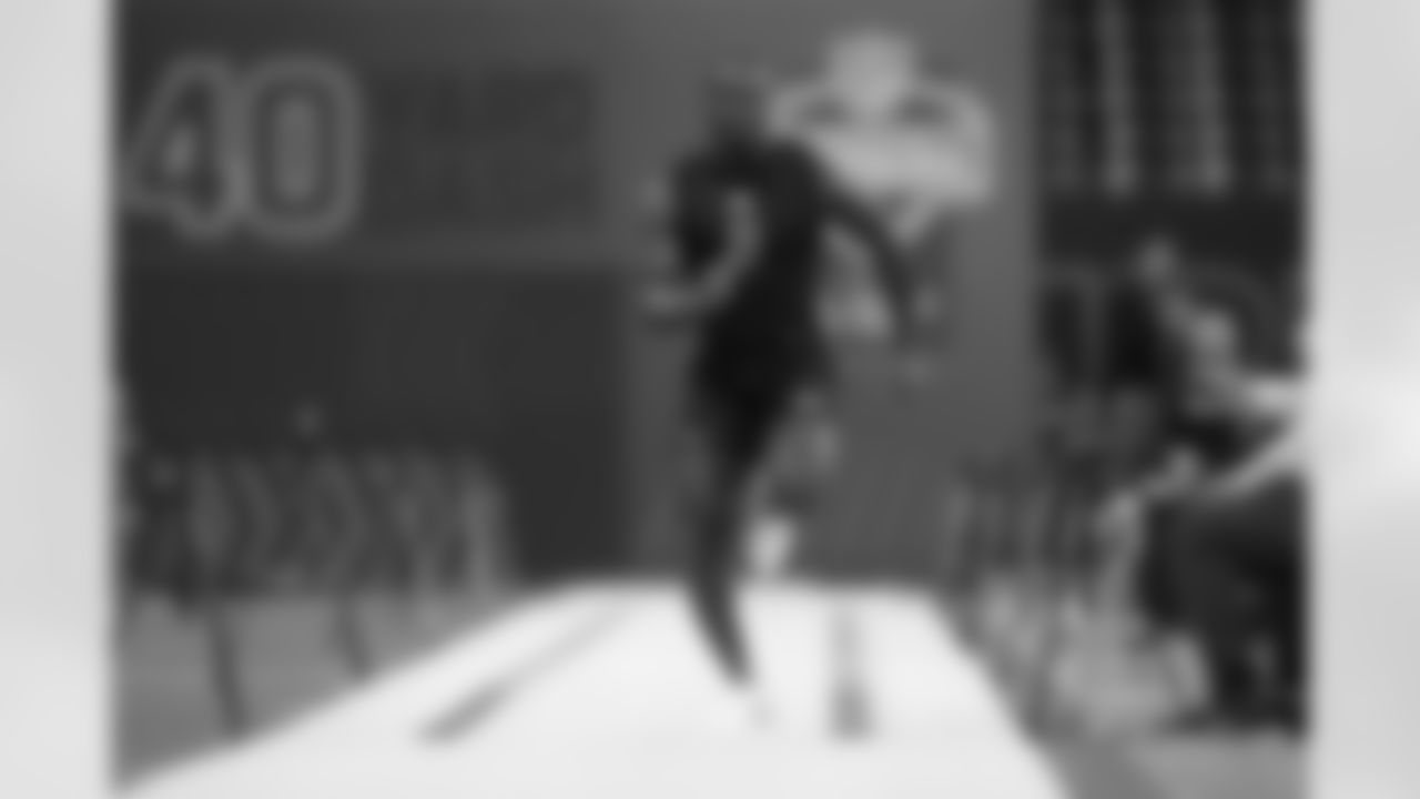 Notre Dame running back Jeremiyah Love (11) runs the 40-yard dash at the NFL football scouting combine in Indianapolis, Saturday, Feb. 28, 2026. (AP Photo/Julio Cortez)