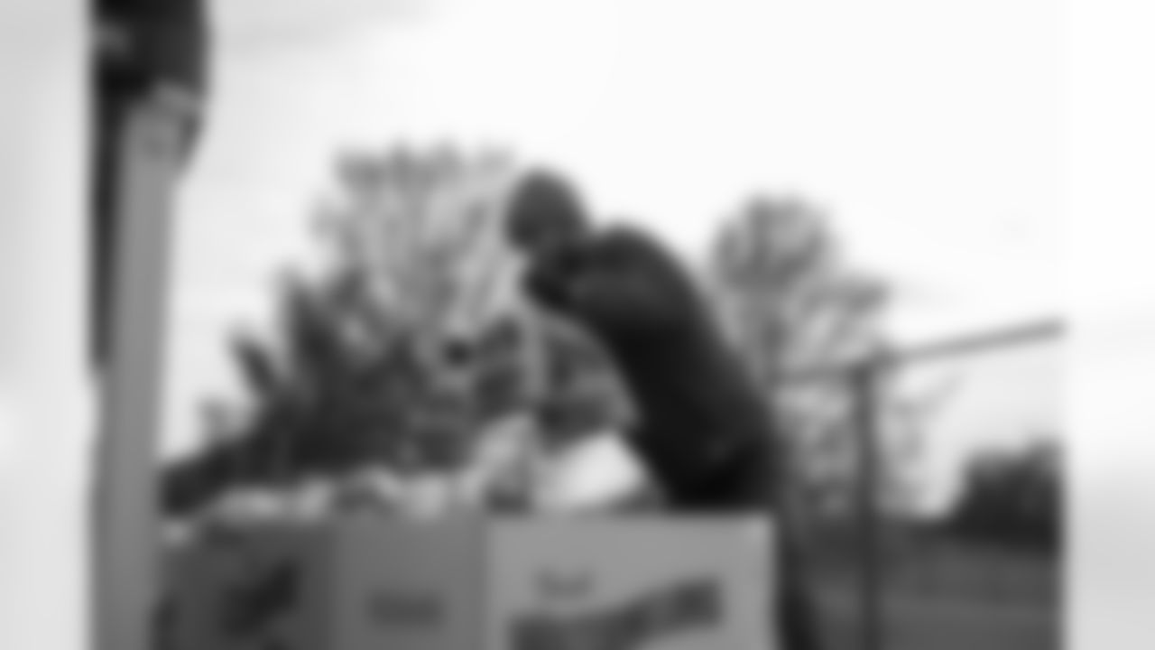 Lions staff and volunteers distribute meals during a Thanksgiving meal distribution event at the Detroit Lions Academy on Nov. 19, 2025 in Detroit. (Carl Jones II/Detroit Lions)