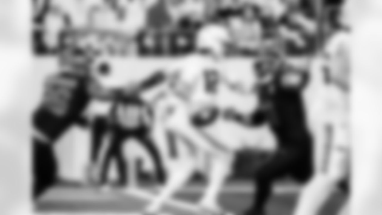 Detroit Lions edge rusher Al-Quadin Muhammad (96) and Detroit Lions defensive lineman Roy Lopez (51) during an NFL football game against the Minnesota Vikings on Thursday, Dec. 25, 2025 in Minneapolis. (Jeff Nguyen/Detroit Lions via AP)