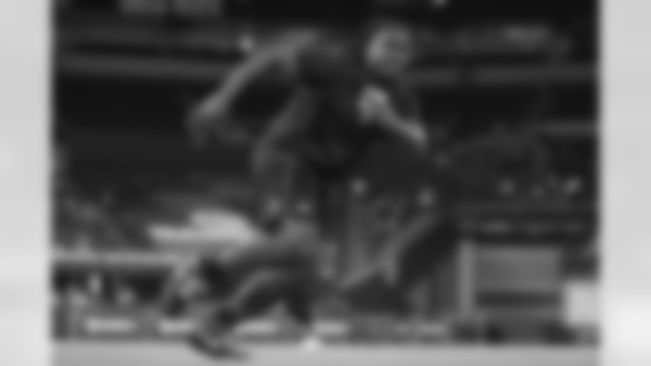 Ucla defensive lineman Gary Smith III (27) runs a drill at the NFL football scouting combine in Indianapolis, Thursday, Feb. 26, 2026. (AP Photo/Michael Conroy)