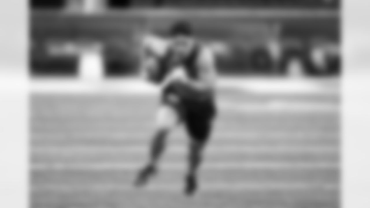 Utah defensive back Sione Vaki runs a drill at the NFL football scouting combine, Friday, March 1, 2024, in Indianapolis. (AP Photo/Michael Conroy)