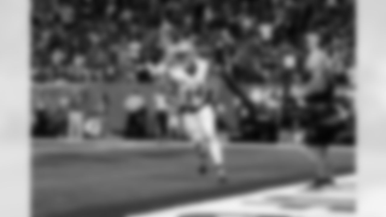 Detroit Lions wide receiver Amon-Ra St. Brown (14) scores a touchdown during an NFL football game against the Houston Texans on Nov. 10, 2024 in Houston. (Jeff Nguyen/Detroit Lions via AP)