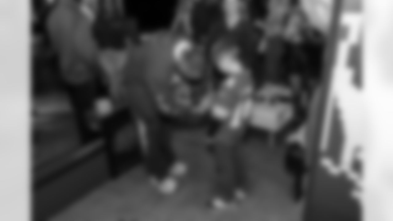 Detroit Lions wide receiver Amon-Ra St. Brown (14) greets guests during a Strike for Literacy event at Five Iron Golf on Nov. 3, 2025 in Detroit.(Carl Jones II/Detroit Lions)