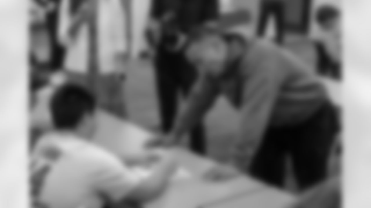 Detroit Lions wide receiver Amon-Ra St. Brown (14) meets with each design group during a shoe design competition event at the Meijer Performance Center on Sept. 27, 2025 in Allen Park, Mich. (Carl Jones II/Detroit Lions via AP)