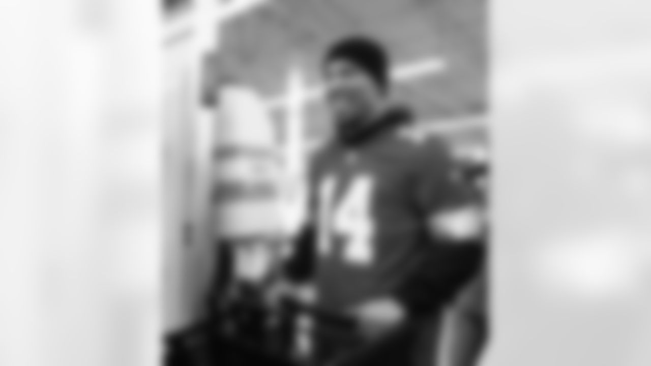 Detroit Lions wide receiver Amon-Ra St. Brown (14) smiling while shopping during Shop with a Lion at Meijer on Dec. 8, 2025 in Detroit. (Izzy Rincon/Detroit Lions)