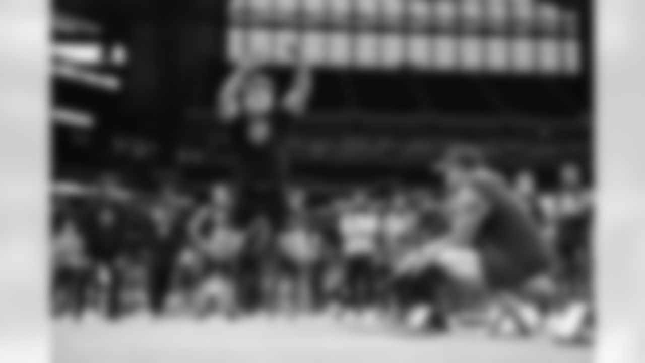 Michigan linebacker Jimmy Rolder (22) participates in the Broad Jump at the NFL football scouting combine, Thursday, Feb. 26, 2026, in Indianapolis. (Gregory Payan/AP Content Services for NFL)