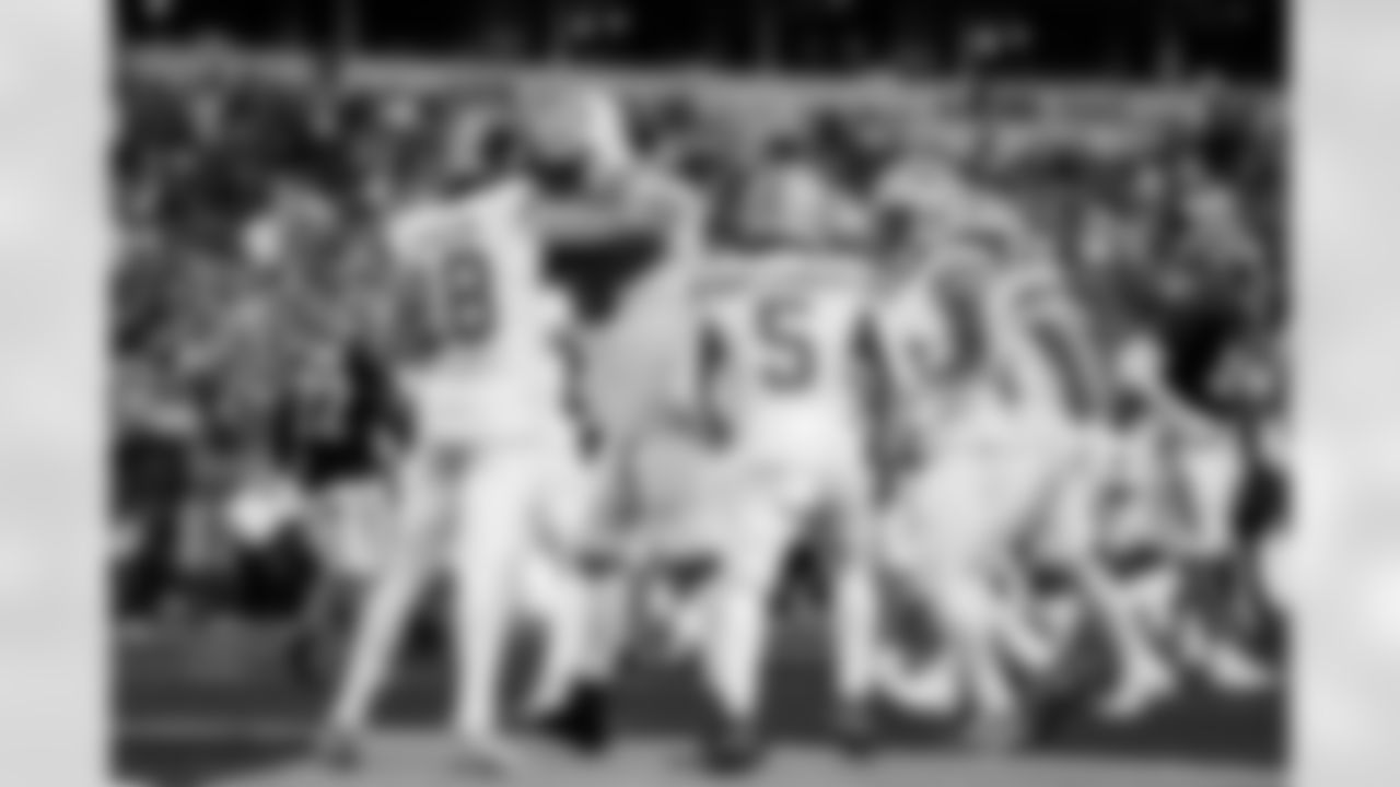 Detroit Lions wide receiver Isaac TeSlaa (18), Detroit Lions offensive lineman Tate Ratledge (69), Detroit Lions running back David Montgomery (5), and Detroit Lions wide receiver Amon-Ra St. Brown (14) celebrate after a touchdown during an NFL football game against the Cincinnati Bengals on Sunday, Oct. 5, 2025 in Cincinnati. (Jeff Nguyen/Detroit Lions via AP)