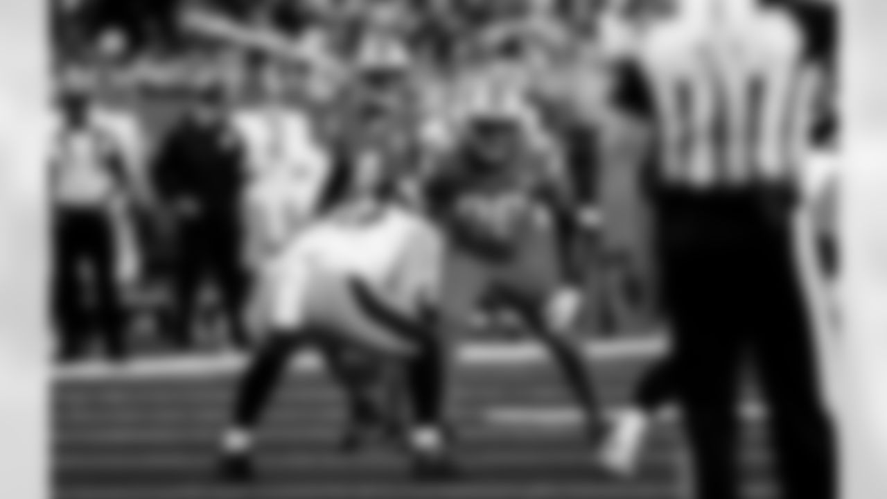 Detroit Lions cornerback D.J. Reed (4) and Detroit Lions edge rusher Al-Quadin Muhammad (96) during an NFL football game against the Pittsburgh Steelers on Sunday, Dec. 21, 2025 in Detroit. (Jeff Nguyen/Detroit Lions via AP)