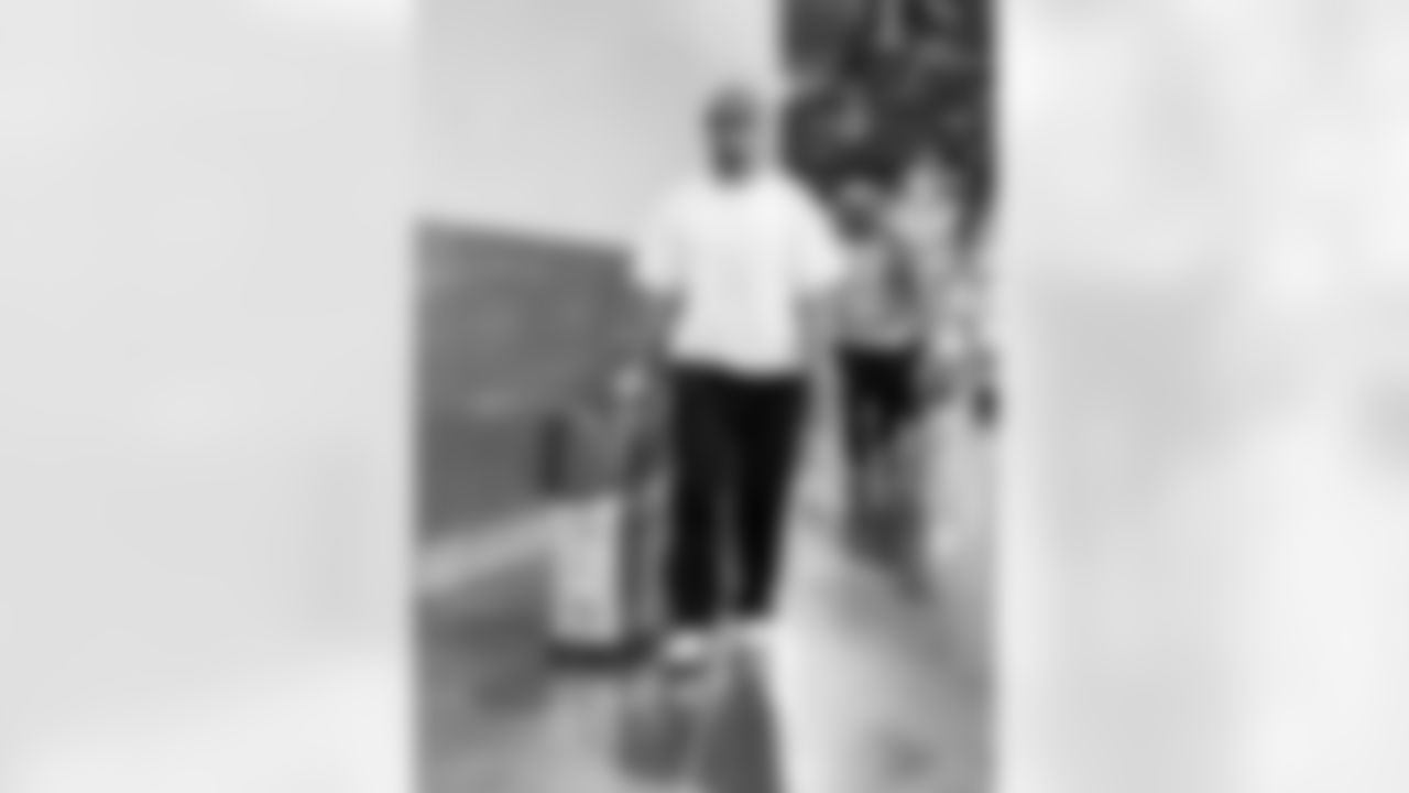 Detroit Lions wide receiver Amon-Ra St. Brown (14) arrives to an NFL football game against the Los Angeles Rams on Sunday, Dec. 14, 2025 in Inglewood, Calif. (Jeff Nguyen/Detroit Lions via AP)