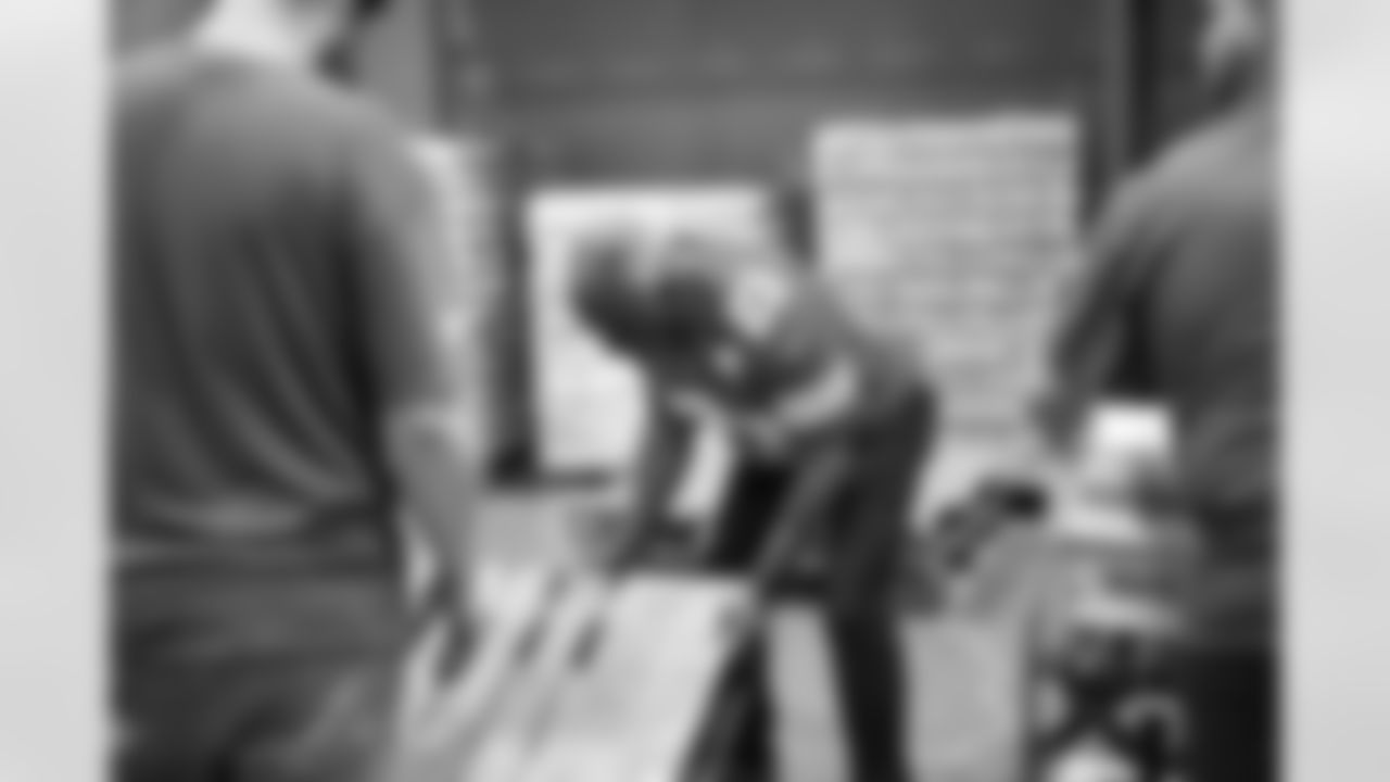Lions Legend Maurice Harvey (23) during a Thanksgiving meal packing event at Gleaners Community Food Bank on Oct. 15, 2025 in Taylor, Mich. (Josh Mandujano/Detroit Lions via AP)