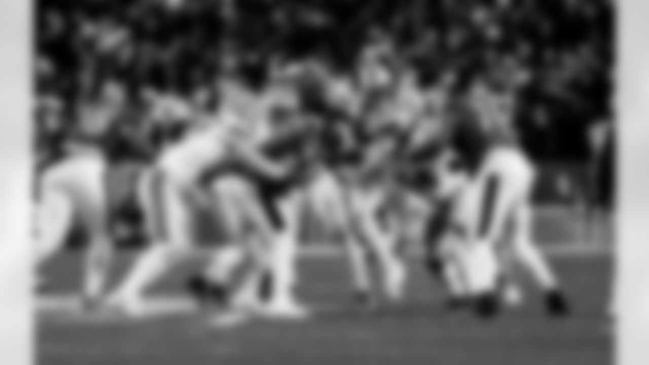 Detroit Lions edge rusher Aidan Hutchinson (97) and Detroit Lions defensive lineman Roy Lopez (51) sack Philadelphia Eagles quarterback Jalen Hurts (1) during an NFL football game against the Philadelphia Eagles on Sunday, Nov. 16, 2025 in Philadelphia. (Jeff Nguyen/Detroit Lions via AP)