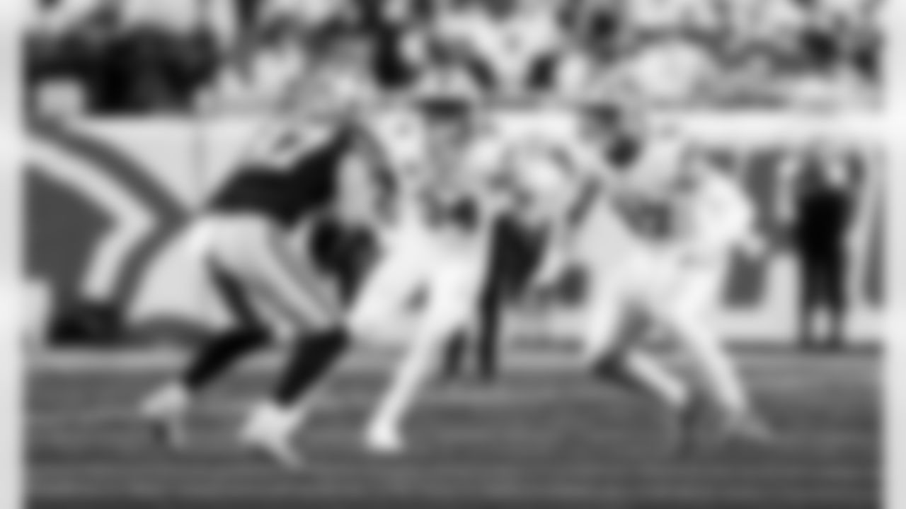 Detroit Lions linebacker Alex Anzalone (34) and Detroit Lions edge rusher Aidan Hutchinson (97) during an NFL football game against the Dallas Cowboys on Thursday, Dec. 4, 2025 in Detroit. (Jeff Nguyen/Detroit Lions via AP)