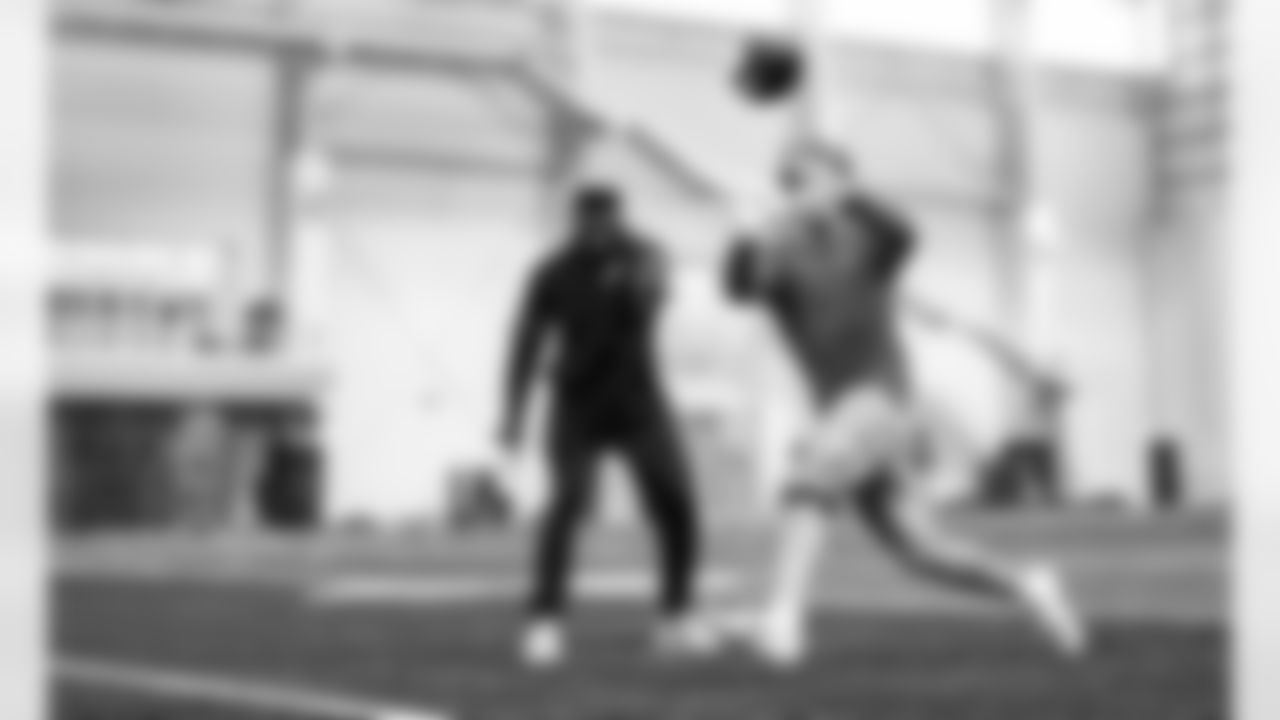Detroit Lions assistant head coach/wide receivers coach Scottie Montgomery and Detroit Lions wide receiver Isaac TeSlaa during offseason workouts at the Meijer Performance Center on May 13, 2025 in Allen Park, Mich. (Jeff Nguyen/Detroit Lions)