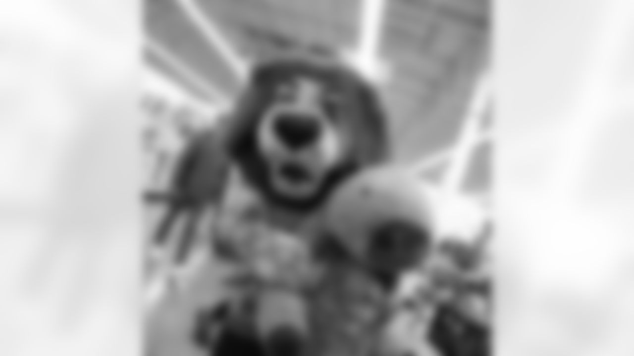 Detroit Lions Mascot Roary posing with a stuffed animal during Shop with a Lion at Meijer on Dec. 8, 2025 in Detroit. (Izzy Rincon/Detroit Lions)