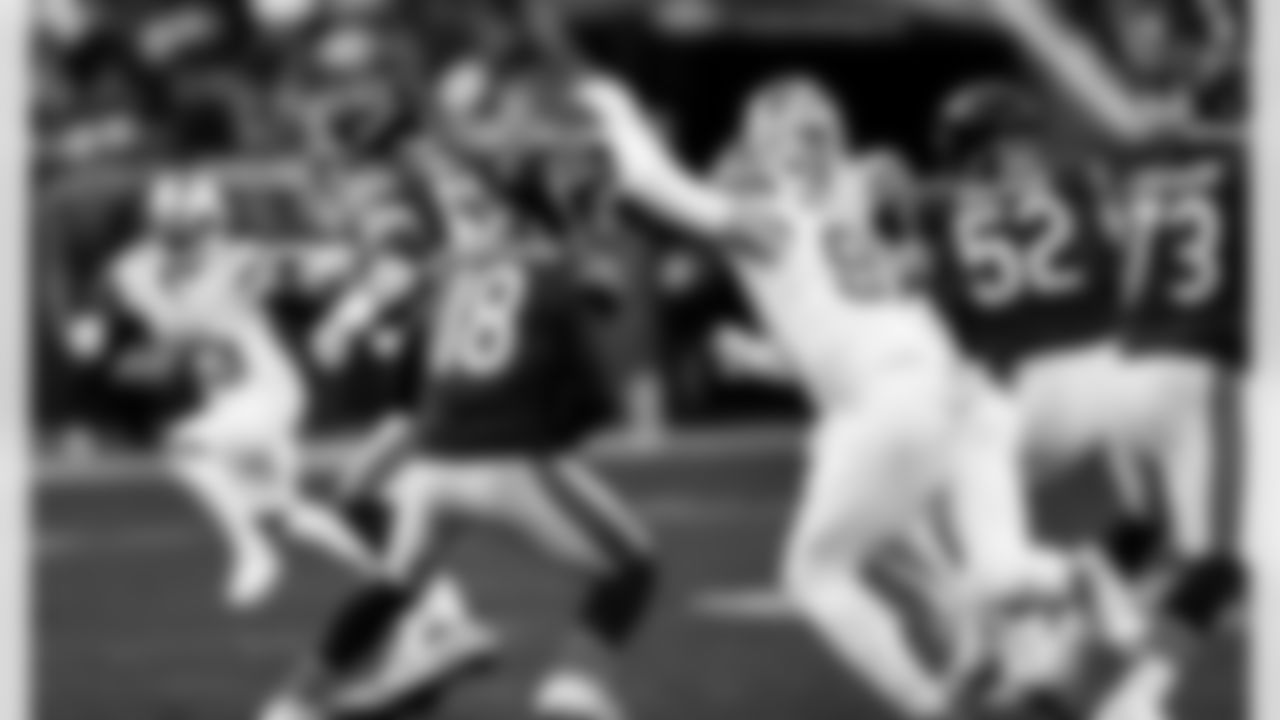 Detroit Lions edge rusher Aidan Hutchinson (97) sacks Chicago Bears quarterback Caleb Williams (18) during an NFL football game against the Chicago Bears on Sunday, Jan. 4, 2026 in Chicago. (Jeff Nguyen/Detroit Lions via AP)