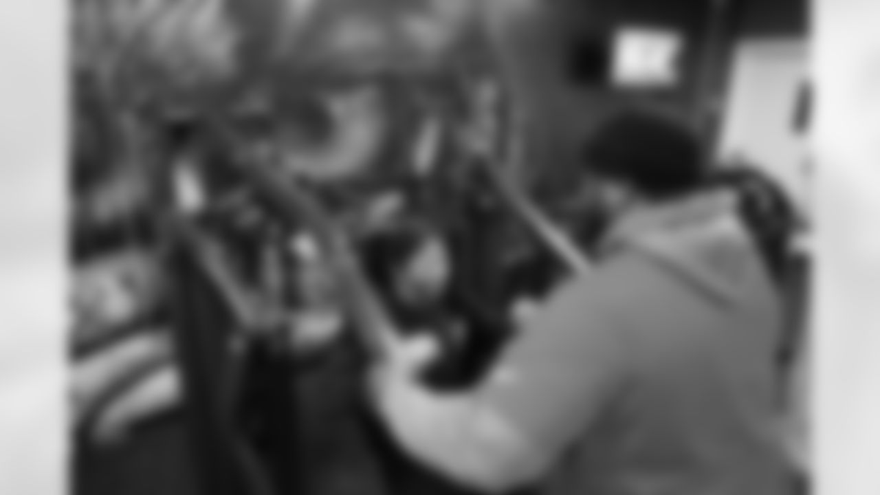 Lions Legend Alex Lewis (59) works with students during a Health and Wellness room reveal during a Count Day activation event at Detroit Lions Academy on Feb. 11, 2026 in Detroit. (Carl Jones II/Detroit Lions)