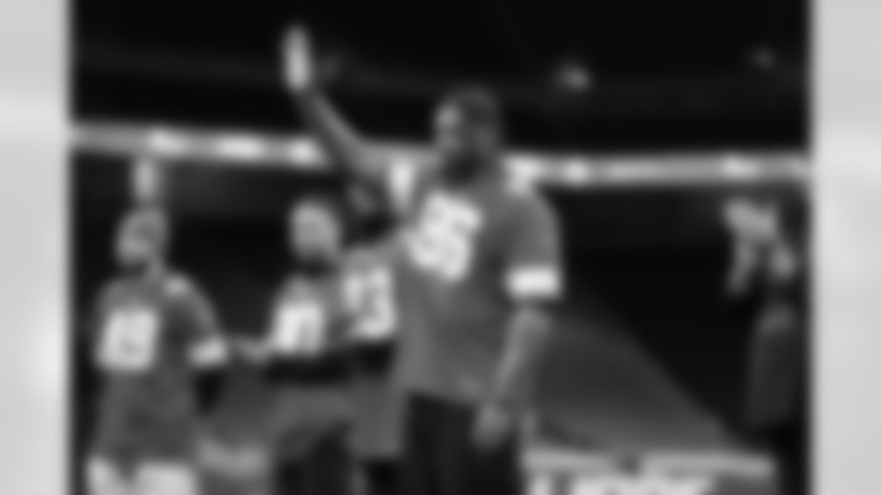 Detroit Lions edge rusher Al-Quadin Muhammad (96) waving to participants during the Inspire Change Football Clinic at Ford Field on Dec. 9, 2025 in Detroit. (Izzy Rincon/Detroit Lions)