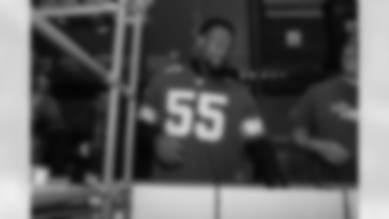 Detroit Lions linebacker Derrick Barnes (55) packing boxes during a Thanksgiving meal packing event at Gleaners Community Food Bank on Nov. 11, 2025 in Taylor, Mich. (Izzy Rincon/Detroit Lions)