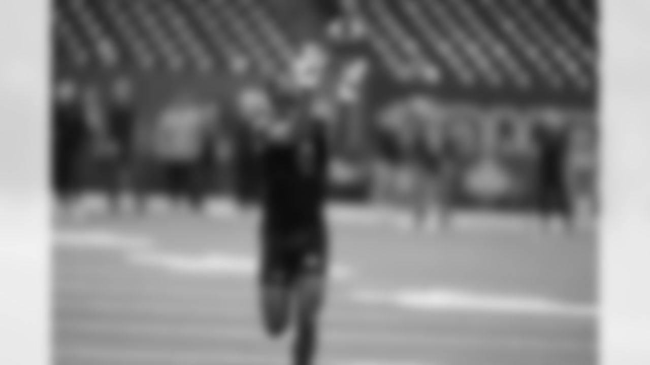 Kansas wide receiver Emmanuel Henderson Jr. (21) runs a drill at the NFL football scouting combine in Indianapolis, Saturday, Feb. 28, 2026. (AP Photo/Michael Conroy)