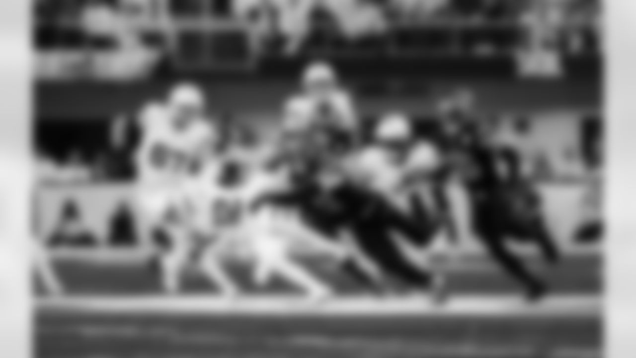 Detroit Lions edge rusher Aidan Hutchinson (97) sacks Minnesota Vikings quarterback Max Brosmer (12) during an NFL football game against the Minnesota Vikings on Thursday, Dec. 25, 2025 in Minneapolis. (Jeff Nguyen/Detroit Lions via AP)