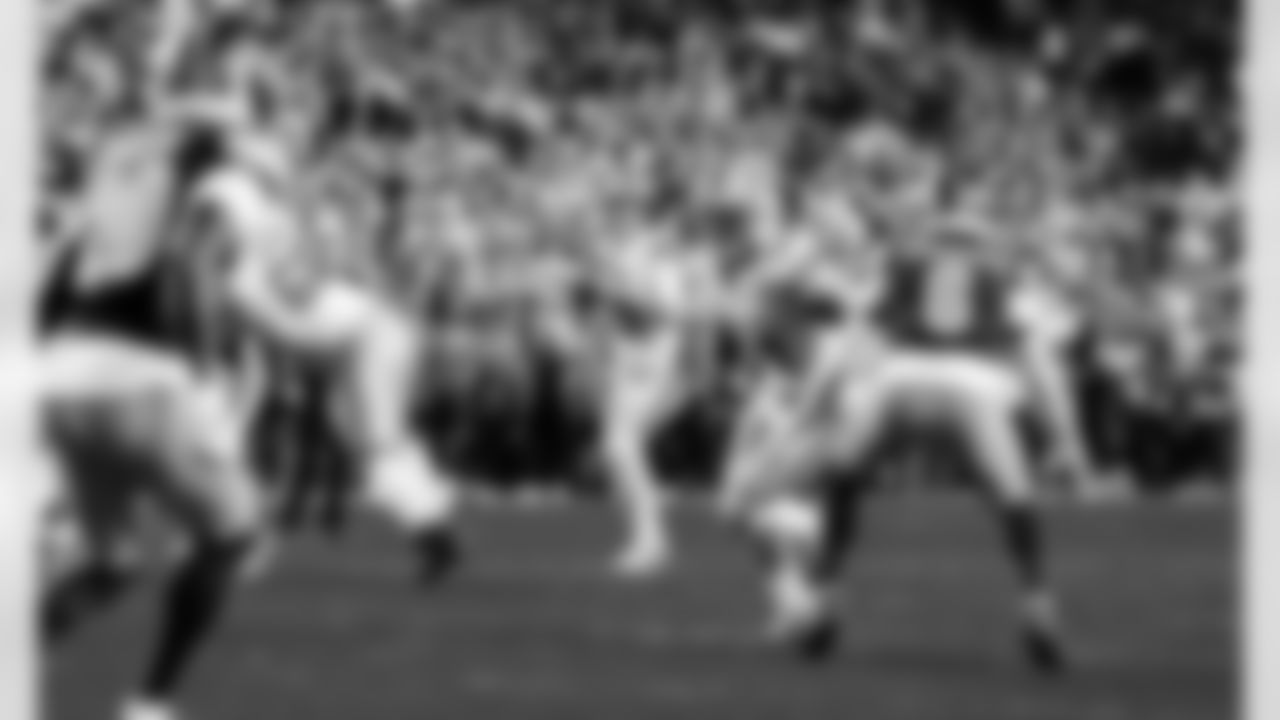 Detroit Lions tackle Taylor Decker (68), Detroit Lions quarterback Jared Goff (16), and Detroit Lions wide receiver Amon-Ra St. Brown (14) during an NFL football game against the Washington Commanders on Sunday, Nov. 9, 2025 in Landover, Md. (Jeff Nguyen/Detroit Lions via AP)