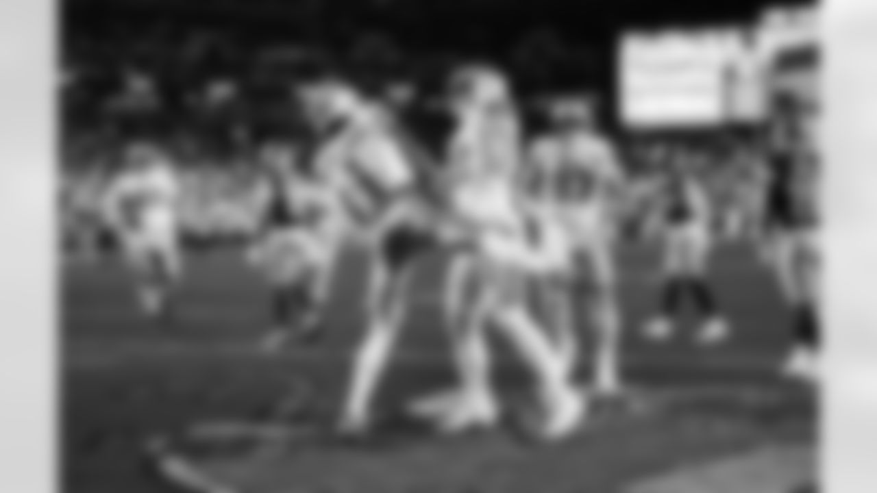 Detroit Lions wide receiver Jameson Williams (1) and Detroit Lions tight end Ross Dwelley (82) celebrate after a touchdown during an NFL football game against the Washington Commanders on Sunday, Nov. 9, 2025 in Landover, Md. (Jeff Nguyen/Detroit Lions via AP)