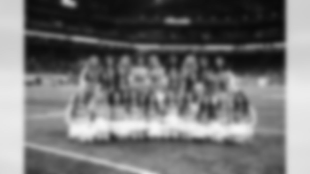 Detroit Lions Cheerleaders take a photo after an NFL football game against the Dallas Cowboys on Thursday, Dec. 4, 2025 in Detroit. (Mike Ferdinande/Detroit Lions via AP)