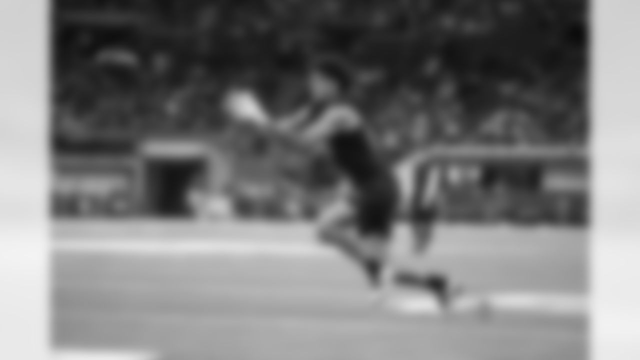 Washington wide receiver Denzel Boston (08) runs a drill at the NFL football scouting combine in Indianapolis, Saturday, Feb. 28, 2026. (AP Photo/Michael Conroy)