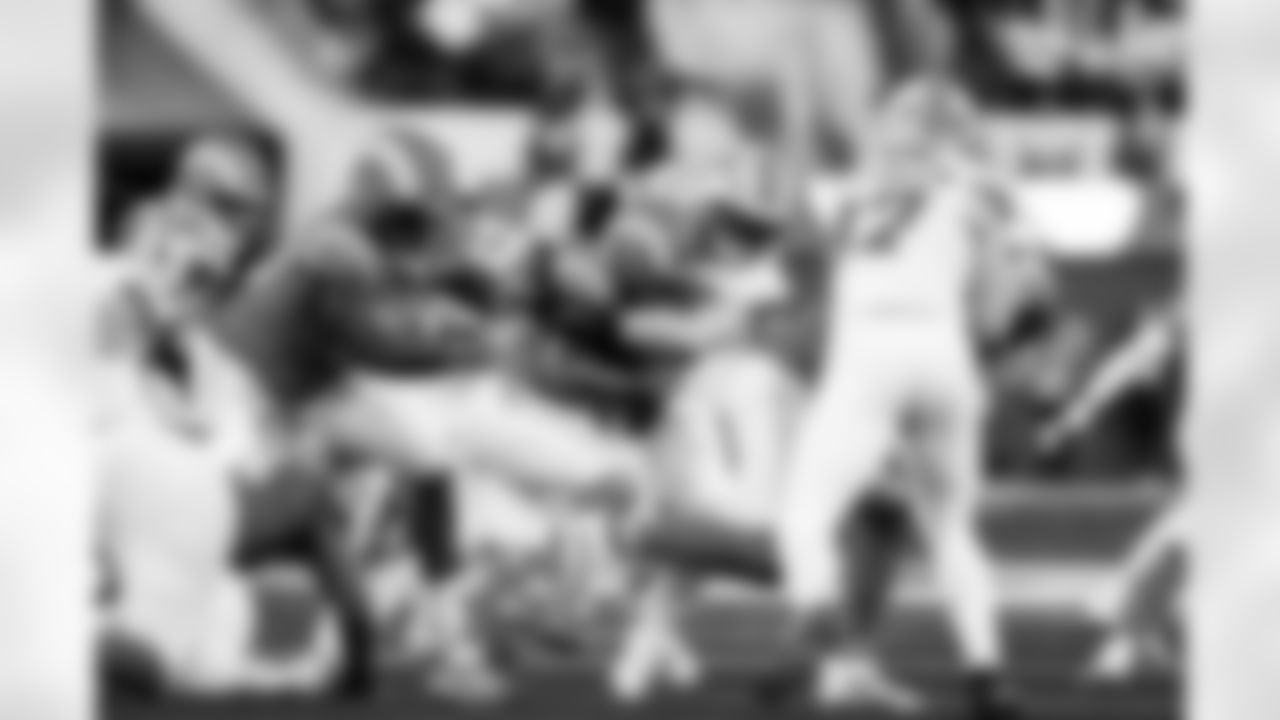 Detroit Lions linebacker Alex Anzalone (34) and Detroit Lions edge rusher Aidan Hutchinson (97) during an NFL football game against the Los Angeles Rams on Sunday, Dec. 14, 2025 in Inglewood, Calif. (Jeff Nguyen/Detroit Lions via AP)