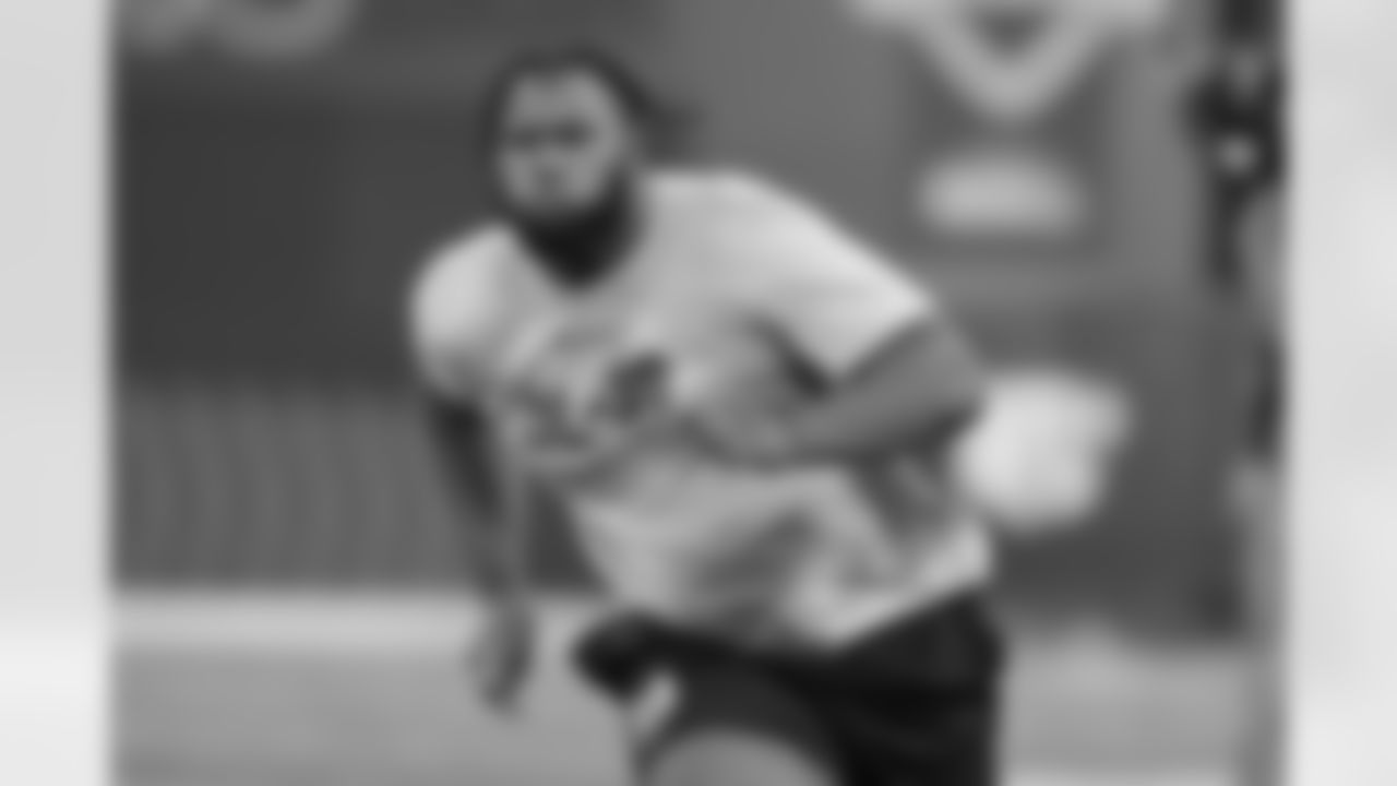 Georgia offensive lineman Sedrick Van Pran-Granger runs a drill at the NFL football scouting combine, Sunday, March 3, 2024, in Indianapolis. (AP Photo/Darron Cummings)