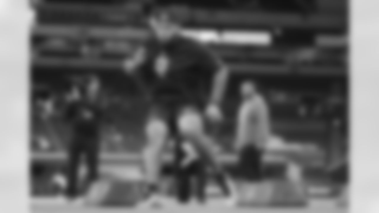 Arkansas defensive lineman Cameron Ball (01) runs a drill at the NFL football scouting combine in Indianapolis, Thursday, Feb. 26, 2026. (AP Photo/Michael Conroy)