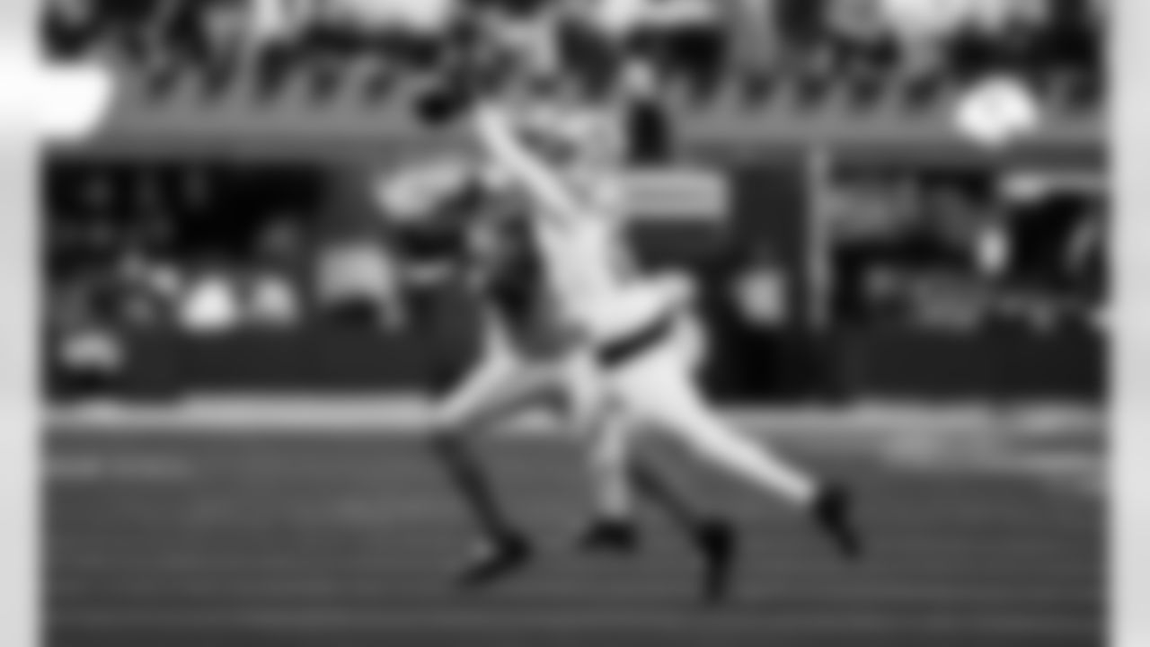 Detroit Lions cornerback Amik Robertson (21) breaks up a pass during an NFL football game against the Los Angeles Rams on Sunday, Dec. 14, 2025 in Inglewood, Calif. (Jeff Nguyen/Detroit Lions via AP)