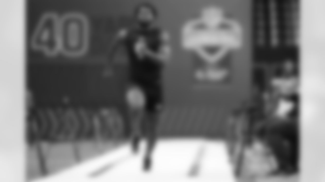 Western Michigan defensive lineman Nadame Tucker (61) runs the 40-yard dash at the NFL football scouting combine in Indianapolis, Thursday, Feb. 26, 2026. (AP Photo/Julio Cortez)