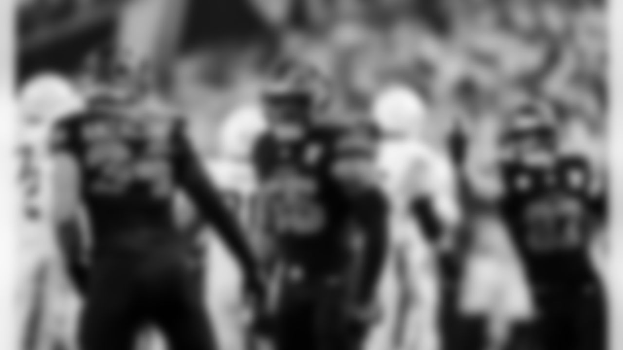 Detroit Lions linebacker Alex Anzalone (34) and Detroit Lions linebacker Derrick Barnes (55) celebrate after a sack during an NFL football game against the Minnesota Vikings on Thursday, Dec. 25, 2025 in Minneapolis. (Jeff Nguyen/Detroit Lions via AP)