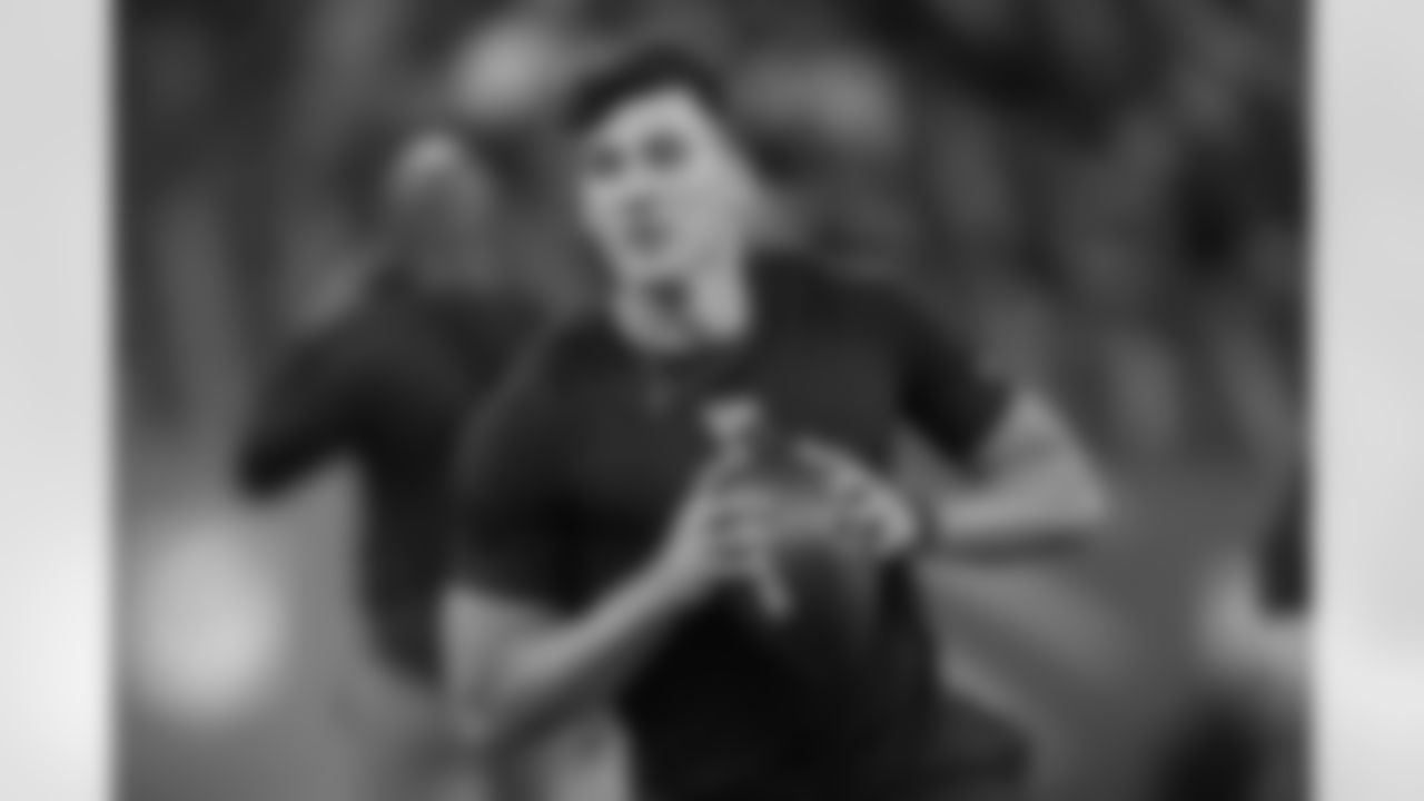 UConn quarterback Joe Fagnano (07) runs a drill at the NFL football scouting combine in Indianapolis, Saturday, Feb. 28, 2026. (AP Photo/Julio Cortez)